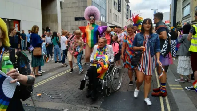 Pride marchers and wheelchair users