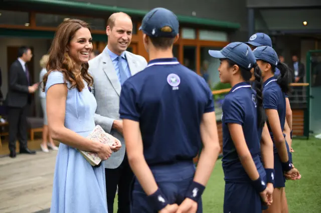 Duke and Duchess of Cambridge meet with the ball boys and girls ahead of the men's singles final