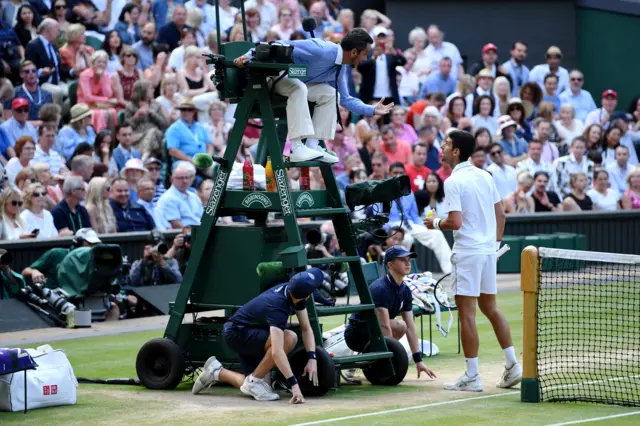 Djokovic with the umpire