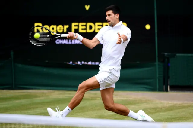 Novak Djokovic hits a forehand