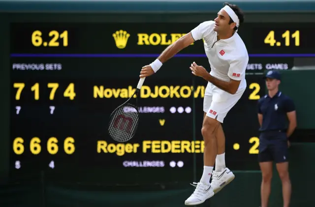 Roger Federer serves for the title