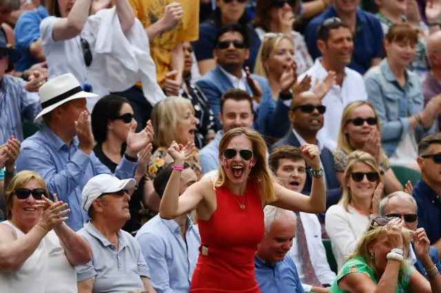 Roger Federer fan with face painted