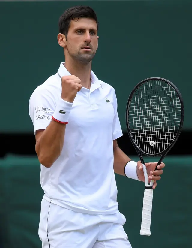 Novak Djokovic pumps his fist