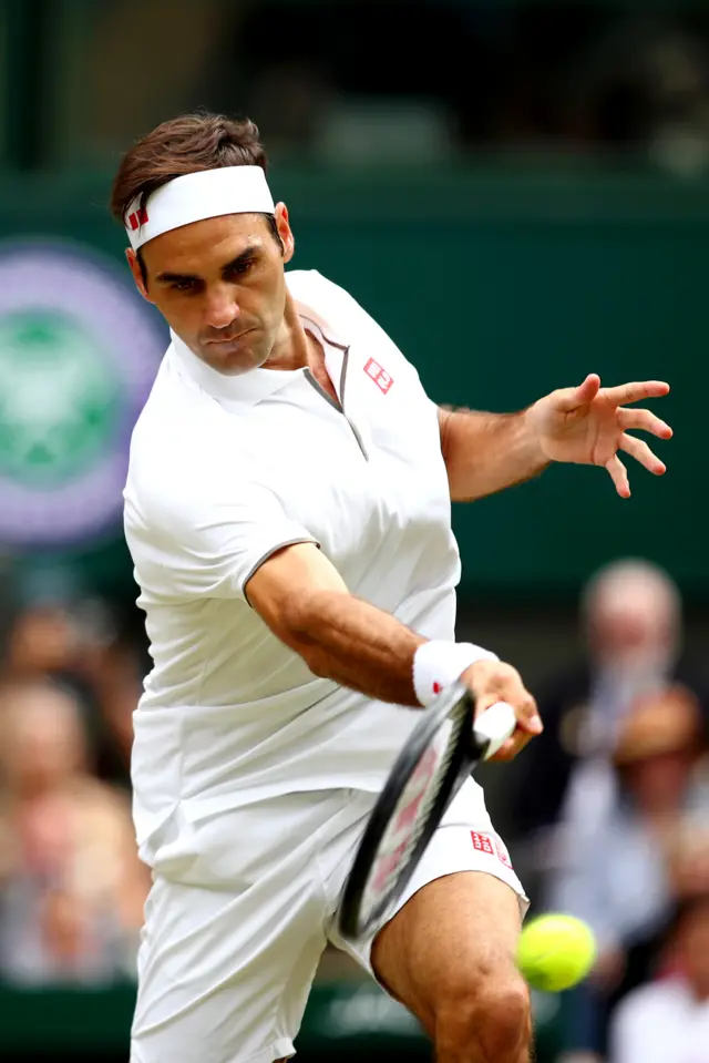 Roger Federer hits a forehand