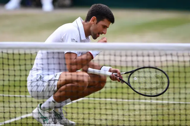 Novak Djokovic eats grass from Centre Court