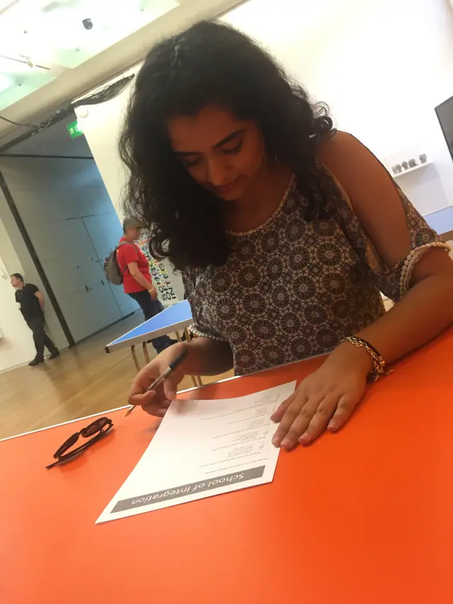 Someone taking the test at a table