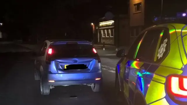 A car stopped by police