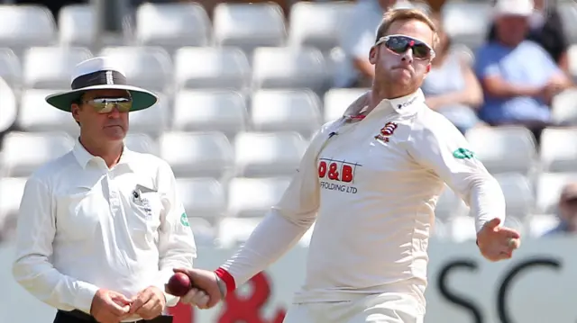 Simon Harmer bowls