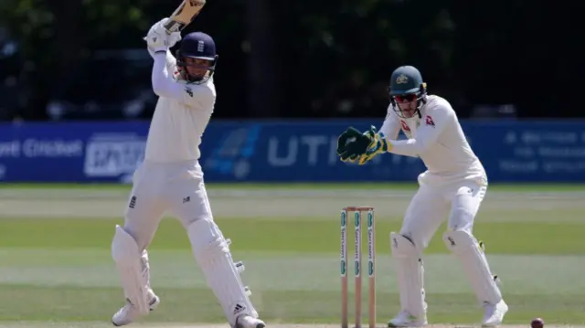 Sam Curran hits in to the offside on his way to scoring 50 for England Lions against an Australia XI at Canterbury