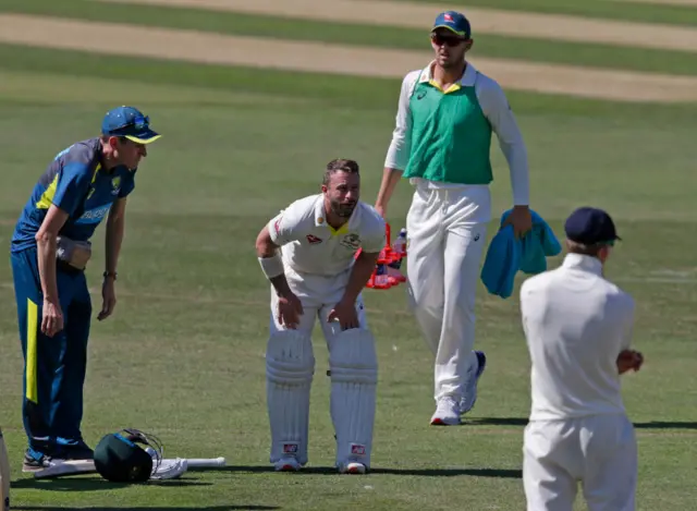 Matthew Wade after being hit by the ball during the Australian XI's match with the England Lions