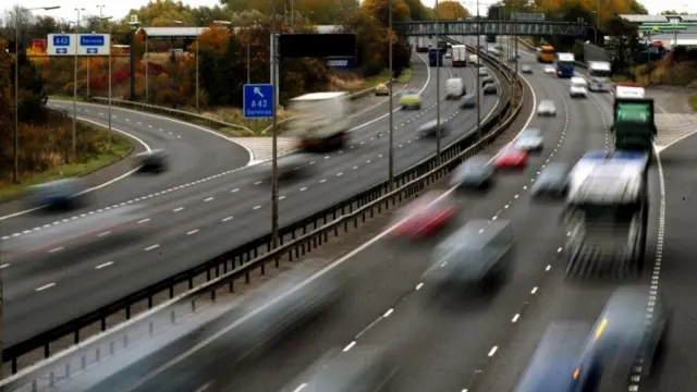 Cars speeding on a motorway