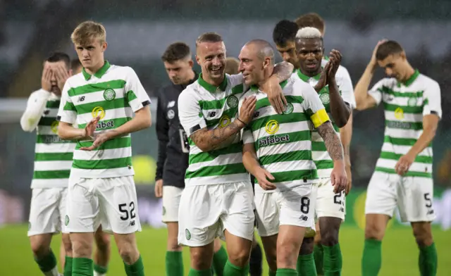 Leigh Griffiths celebrates with Celtic skipper Scott Brown at full time