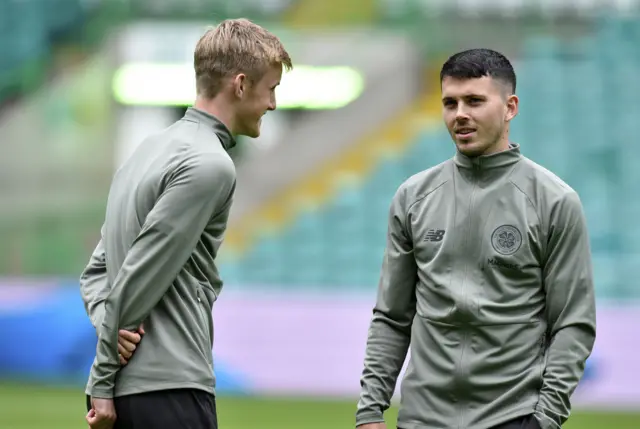 Lewis Morgan (right) in conversation with Ewan Henderson at Celtic Park