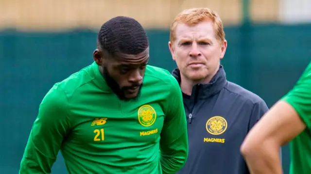 Neil Lennon watches over Olivier Ntcham at training yesterday