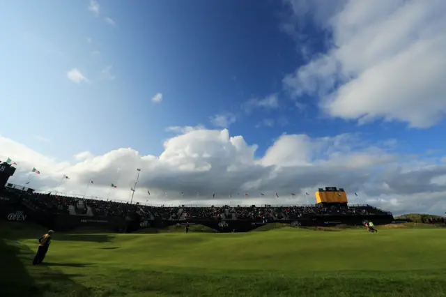 Sun is out on the 18th green