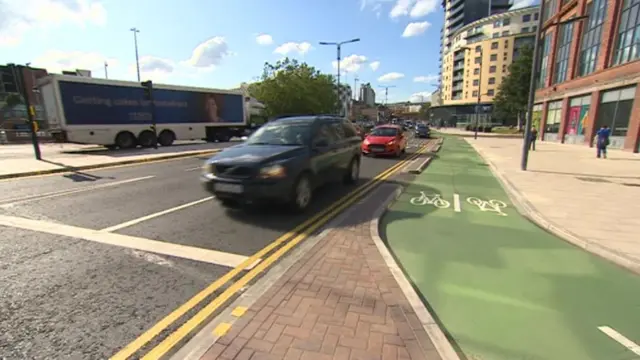 A car near the cycle lane