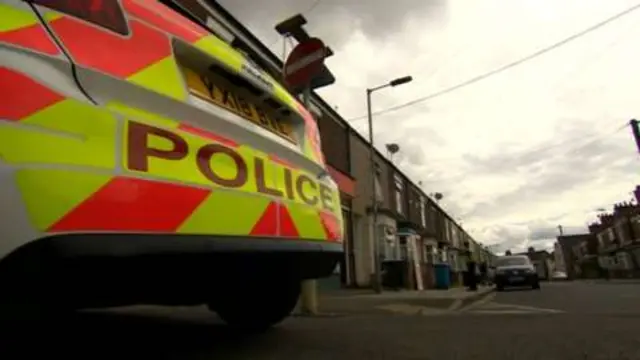 A police car at the scene