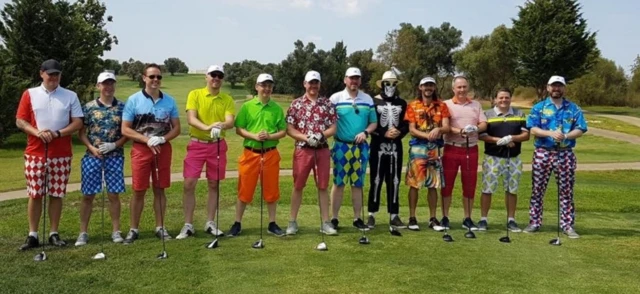 Golfers in bright clothers