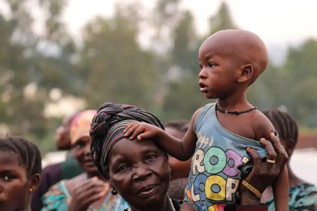 Woman and child at camp for displaced people in DR Congo