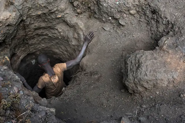 Man going down into a mine