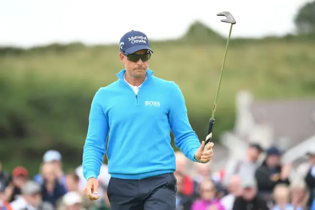 Henrik Stenson celebrates holing a putt