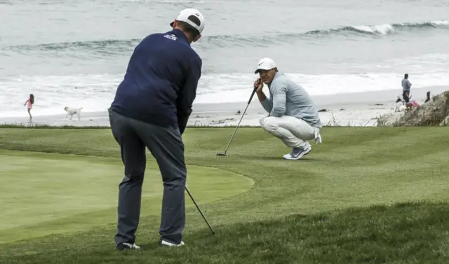 Justin Rose and Brooks Koepka at Pebble Beach on the final day of the US Open
