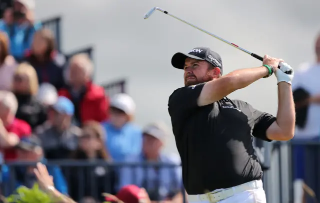 Shane Lowry hits his tee shot at the third hole