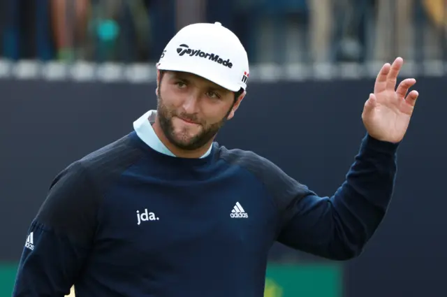 Irish Open champion Jon Rahm salutes the crowd on the first tee
