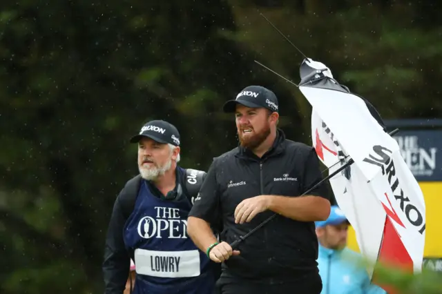 Shane Lowry with broken umbrella