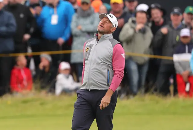 Lee Westwood looks to the sky after a missed putt