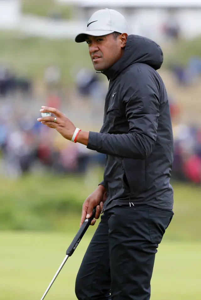 Tony Finau in a hooded cagoule