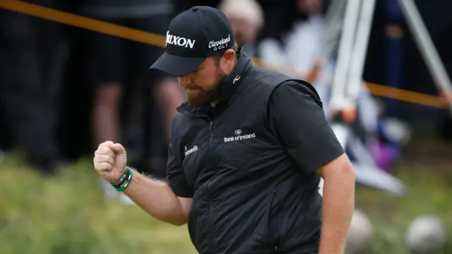 Shane Lowry pumps his fist after picking up another shot on the 10th