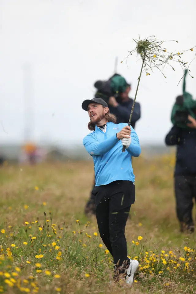 Tommy Fleetwood hits from the rough