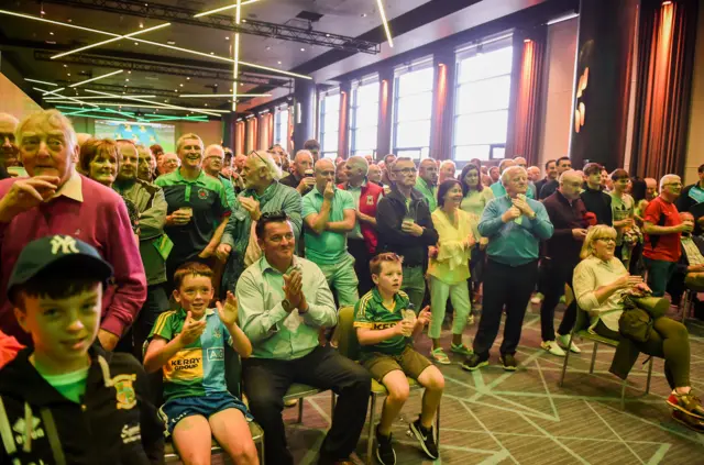 Supporters gather round the big screen inside Croke Park in Dublin to cheer on Shane Lowry after attending an All-Ireland Senior Championship match between Mayo and Meath