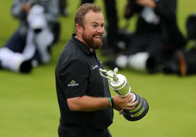 Shane Lowry laughs with the Claret Jug