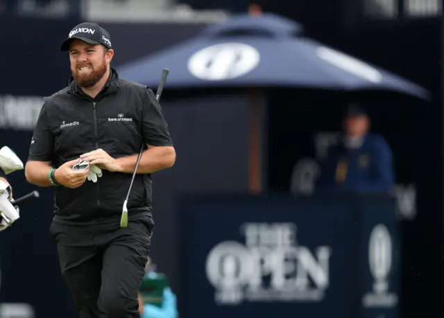 Shane Lowry's smile drops after his opening tee shot finds deep rough