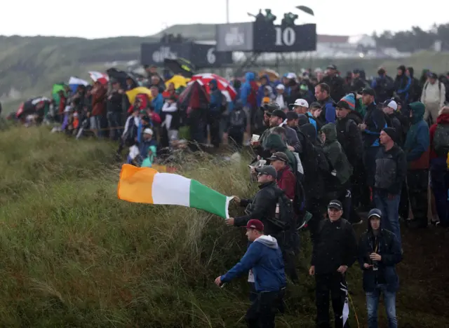 Shane Lowry's fans brave the worsening conditions