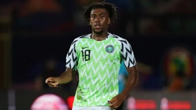 Alex Iwobi seen on pitch wearing the Nigeria strip