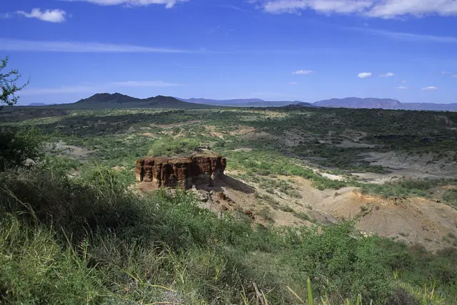 Olduvai Gorge in Tanzania is seen from a hilltop.