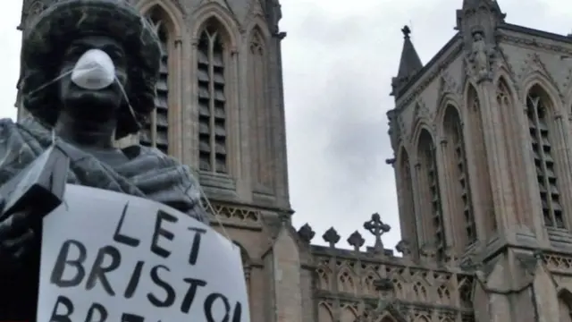 Statue with mask on