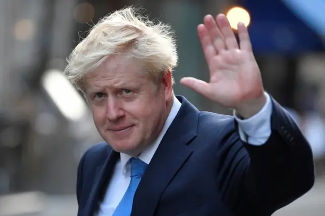 Boris Johnson, leader of the Britain"s Conservative Party, leaves a private reception in central London, Britain