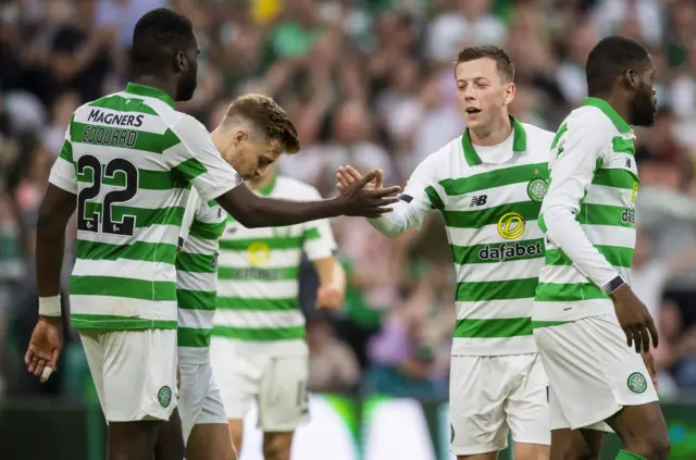 Callum McGregor is congratulated after adding Celtic's fifth goal