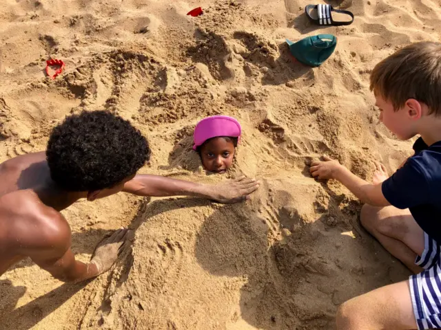 Girl in sand