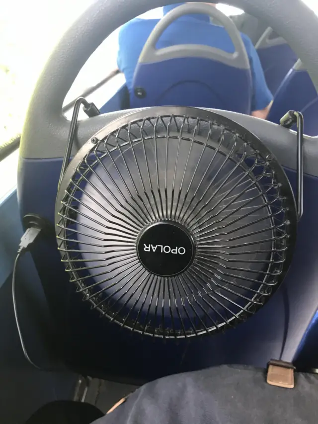 USB fan on keeps bus passenger cool