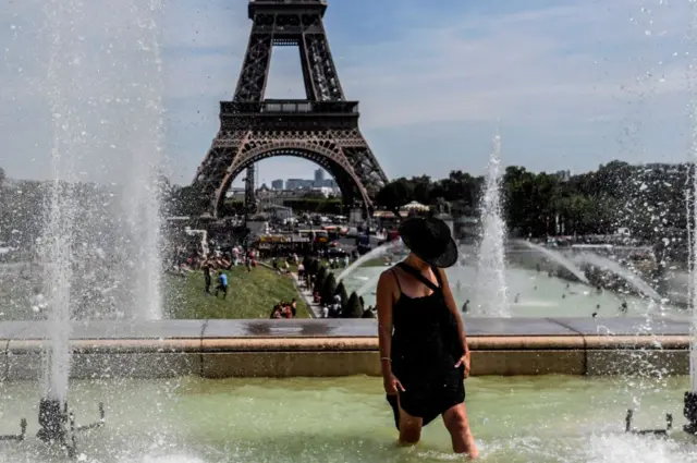 Woman in fountain in Paris