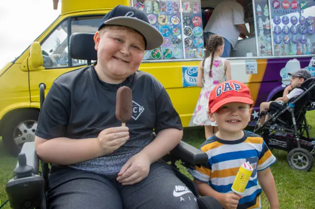 Boys eat ice cream