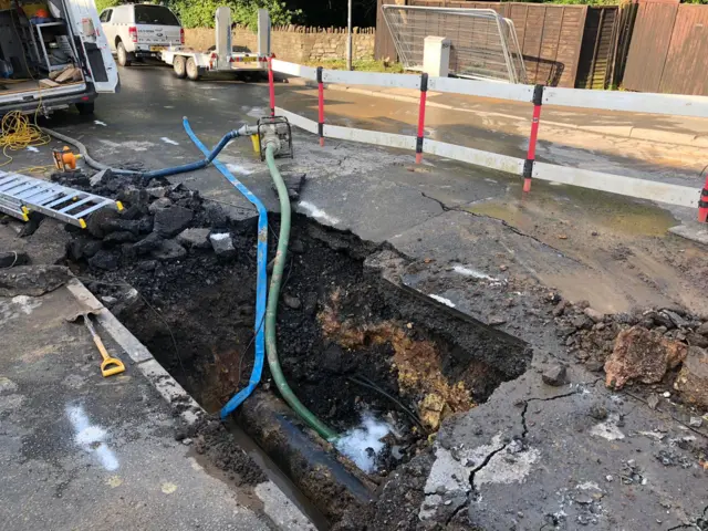 Hole to repair water main