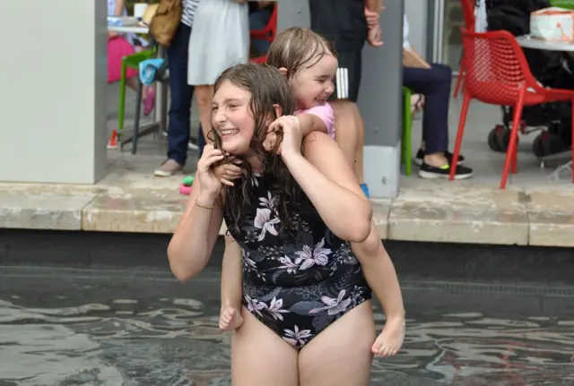 Bristol kids in the fountains in summer