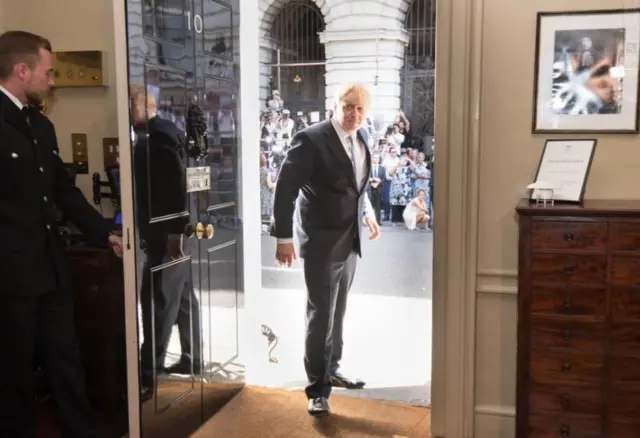 Boris Johnson enters 10 Downing Street