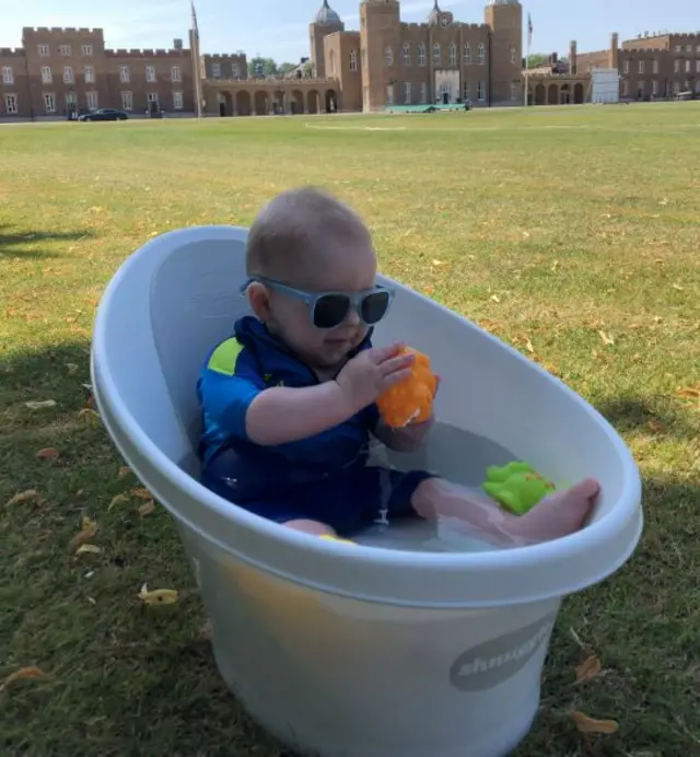 Baby in a bucket